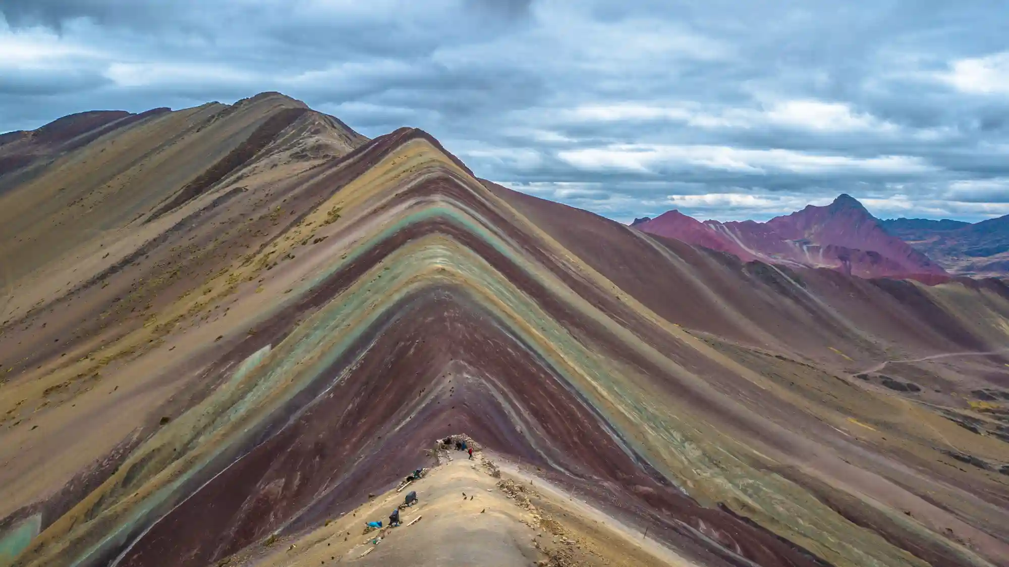 Pallay Poncho Rainbow Mountain Private Transport